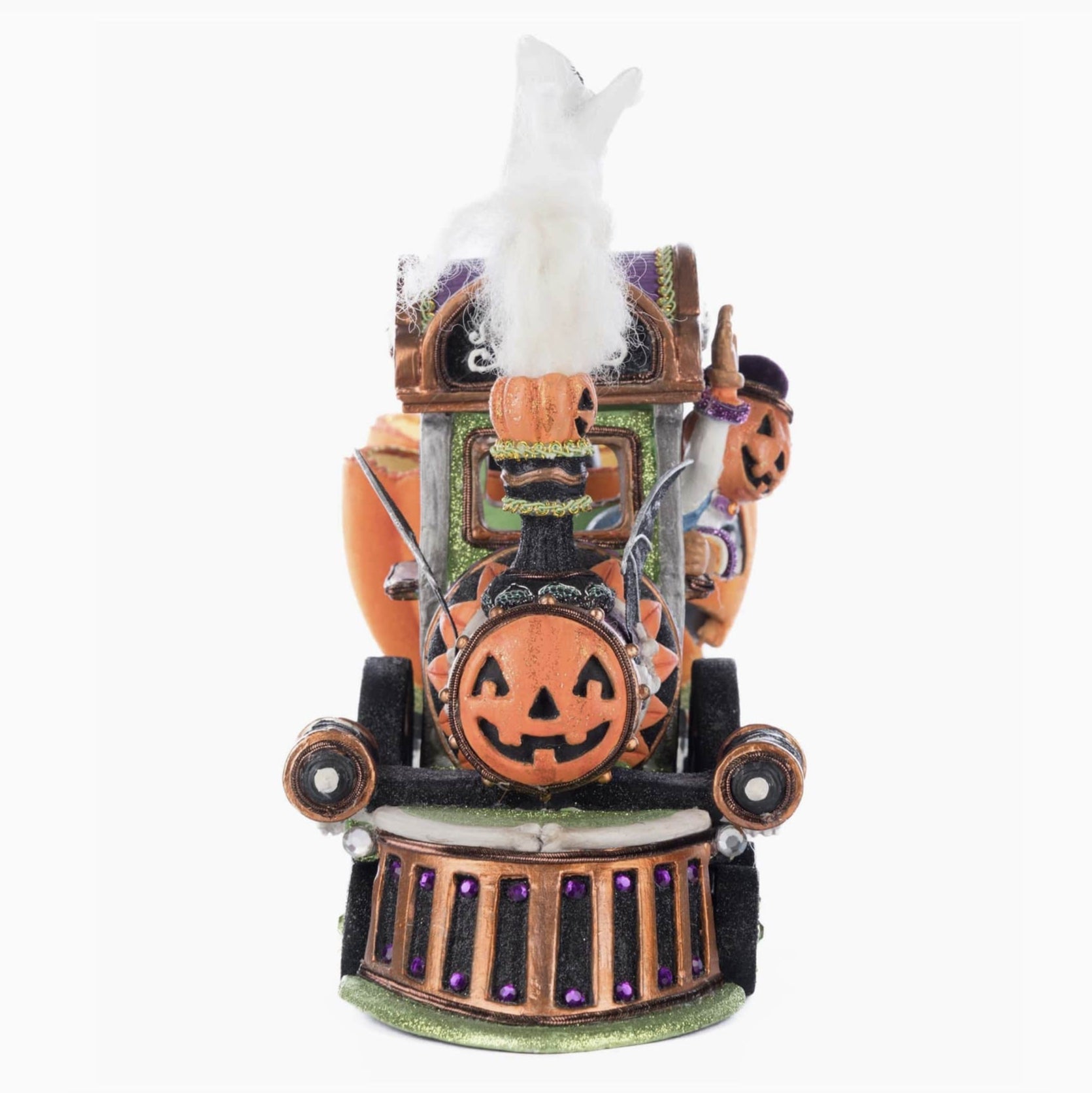 Detail of the cheerful conductor and airbrushed velvet train engine.