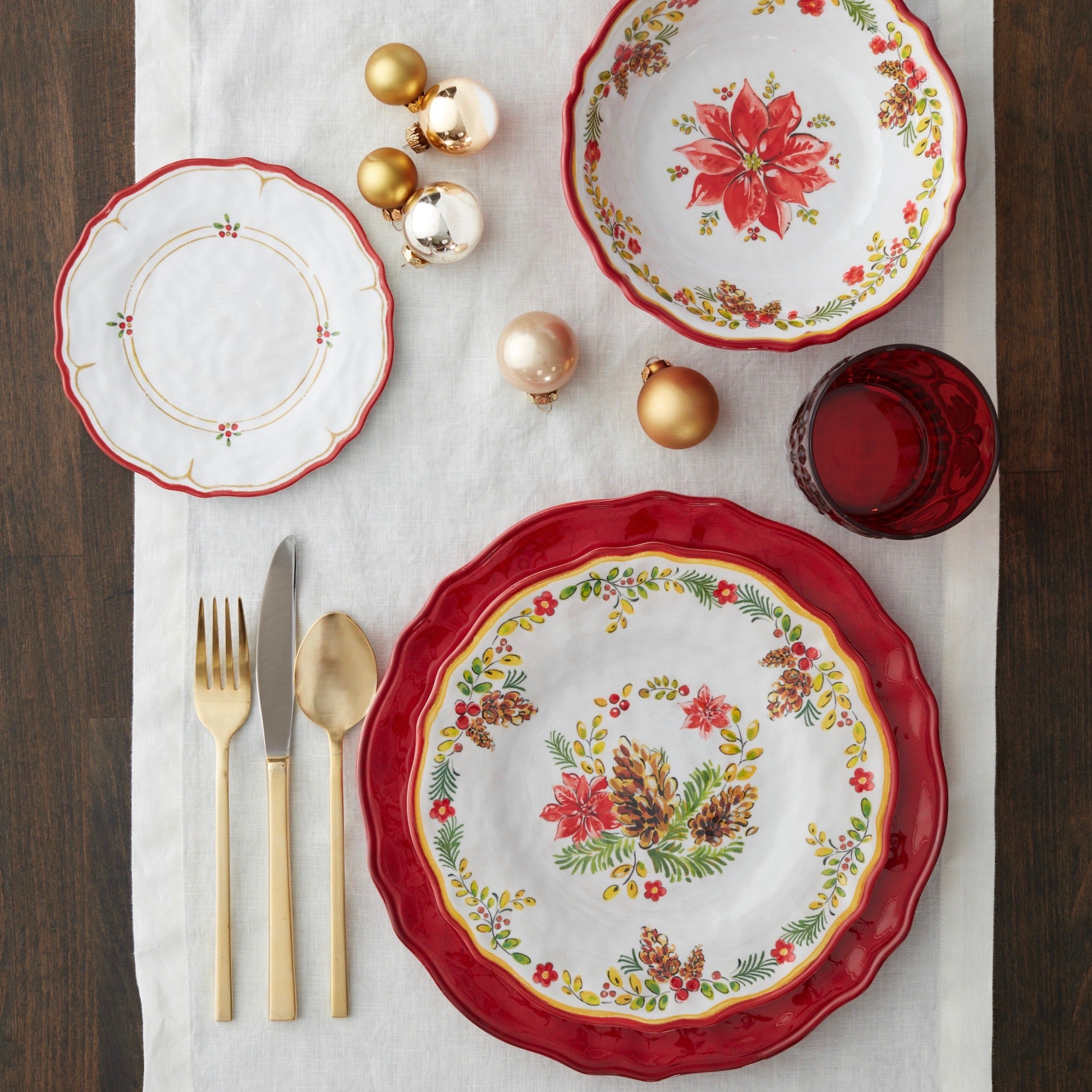 Le Cadeaux Garnet Dinner Plates in deep red melamine finish for holiday dining with Le Cadeaux Noel, and Natale Plates