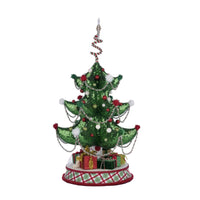 Side angle of Katherine’s Collection Whimsical Table Top Tree with sparkling ornaments and custom fur-lined hat.