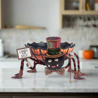 Katherine's Collection Broomstick Acres candy holder with metal legs and whimsical details