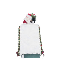 Side view of Countdown to Christmas House showing garlands and ornaments