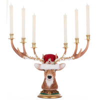 Katherine’s Collection Royal Christmas Ball Deer Head Candelabra with white-accented antlers, six candle holders, and red rhinestone cap with tassel