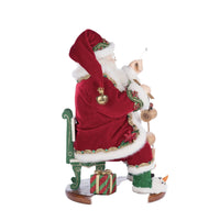 Right-side-close-up of jeweled velvet coat on Holiday Magic Santa With Marionette