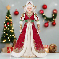 Handcrafted Christmas figurine of Queen Noelle Claus dressed in opulent holiday attire with brocade trim, rhinestones, and a royal gemstone tiara