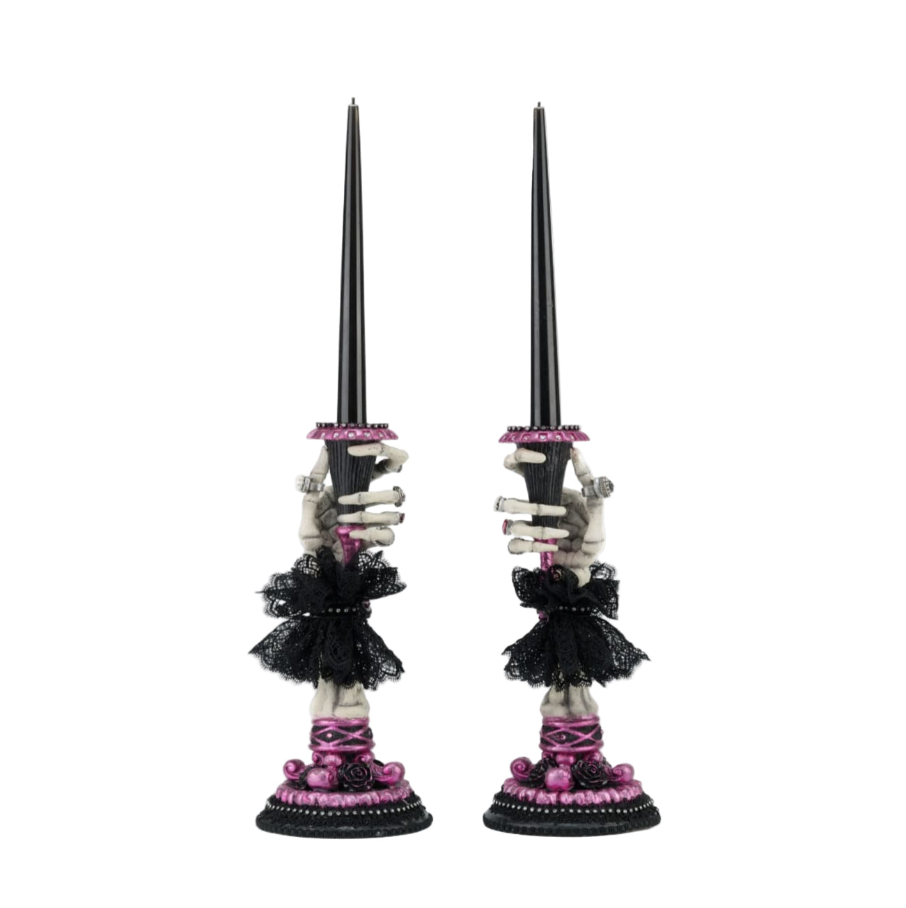 Side view one of Katherine’s Collection Skeleton Hand Candle Stick, resin skeleton hand holding battery-operated black candle.