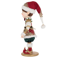 Holiday collectible elf William Wintersnap wearing a richly detailed red and green outfit with festive textures and handcrafted embellishments