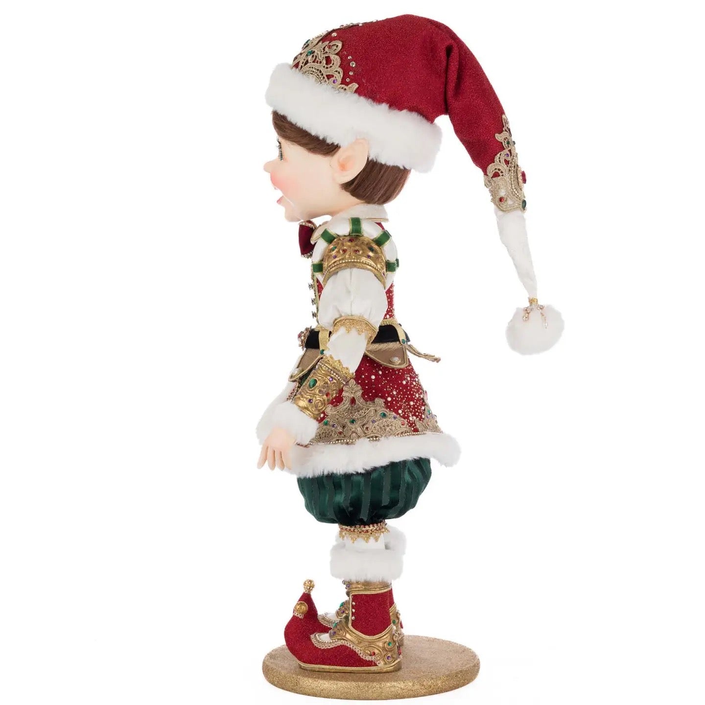 Holiday collectible elf William Wintersnap wearing a richly detailed red and green outfit with festive textures and handcrafted embellishments
