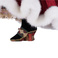 left side view of Katherine’s Collection Holiday Magic Mrs. Claus doll for festive décor close up of shoes