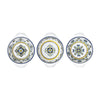 Three ceramic plates with decorative patterns on a white background