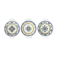 Three ceramic plates with decorative patterns on a white background