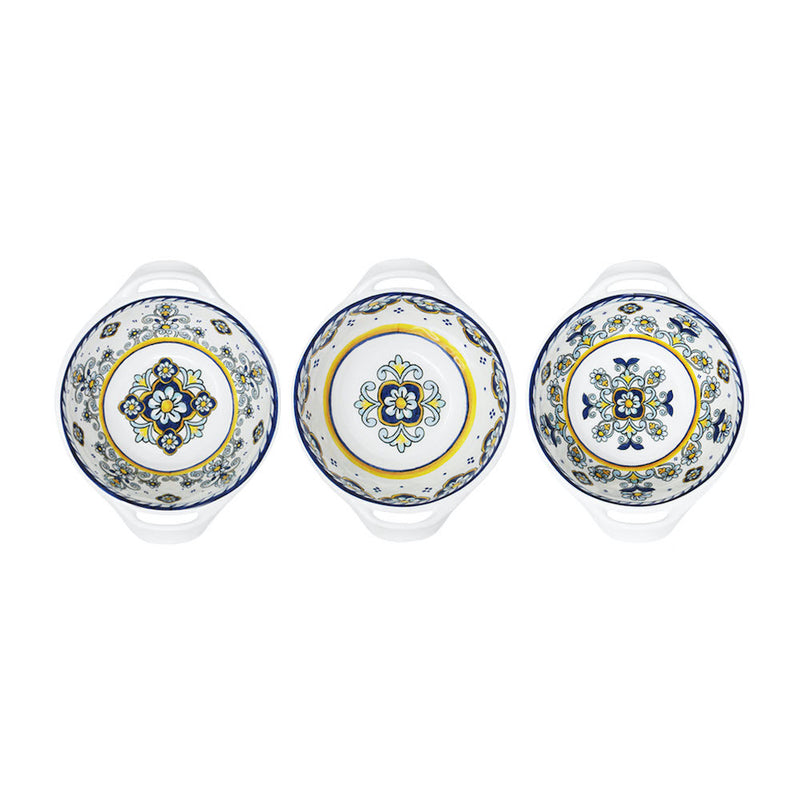 Three ceramic plates with decorative patterns on a white background