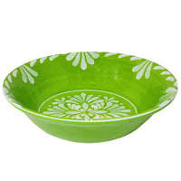 Le Cadeaux Paloma Green Cereal bowl with white floral patterns on a white background