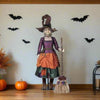 28-428160-katherines-collection-broomstick-acres-gertrude-grimoir-witch-life-size-doll-50-inches-front-view-in-room