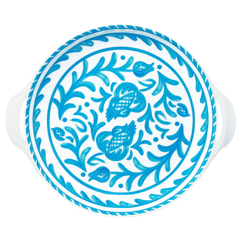 top view of le cadeaux Sicily teal decorative serving bowl with blue floral patterns on a white background