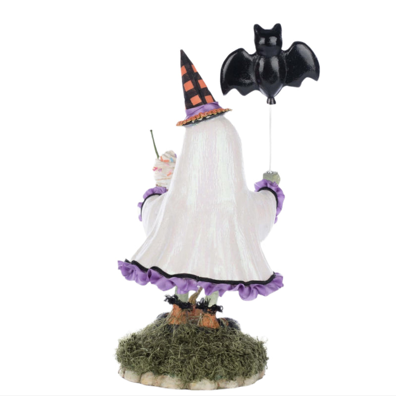Rear angle showing the shadow the ghost girl figurine flowing organza ghost gown, and detailed hand-painted textures, back of bat balloon and ice blended coffee beverage with whipped cream.