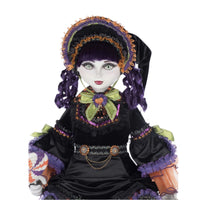 Decorative doll with intricate clothing and accessories on a white background