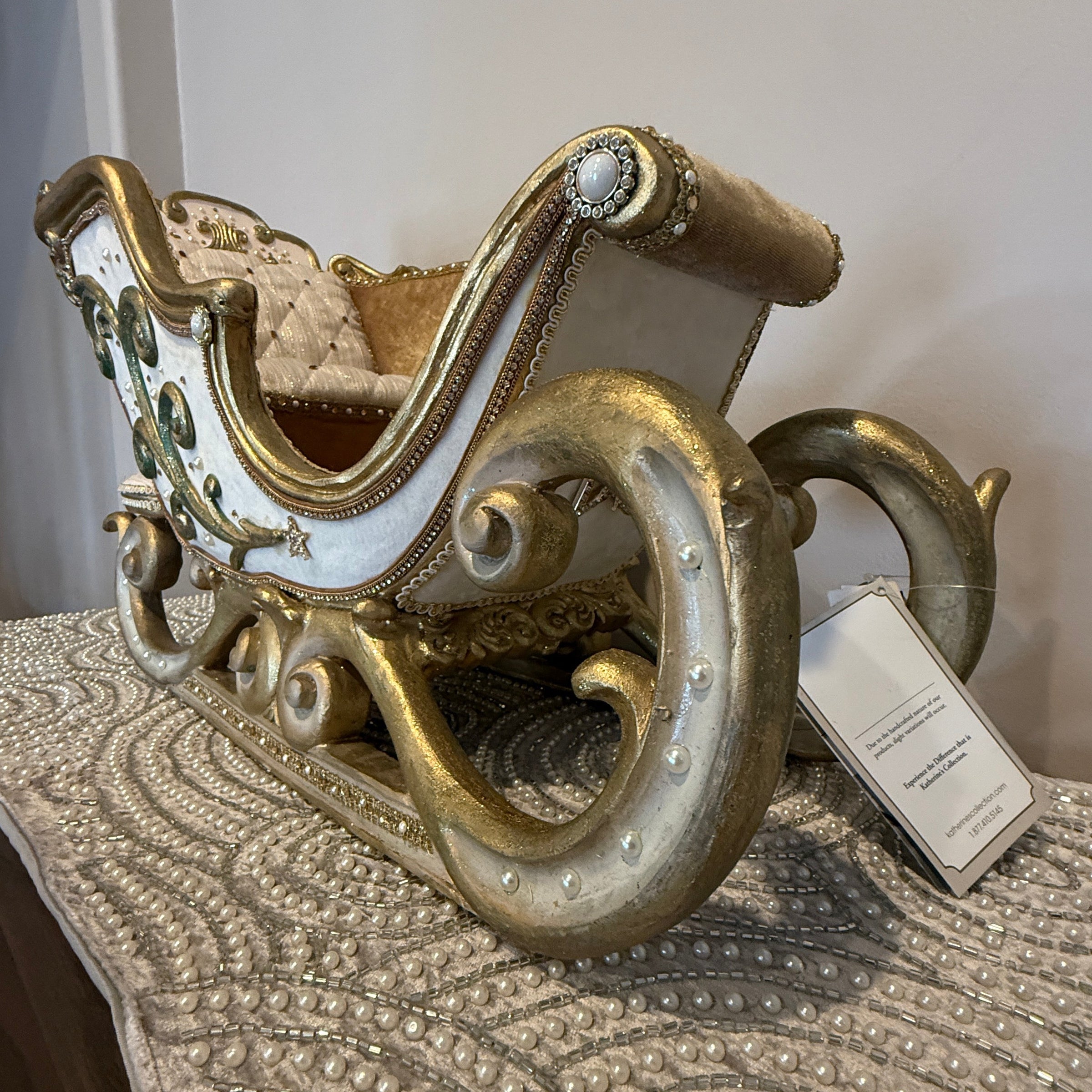 Detailed close-up of Katherine’s Collection All That Glitters Sleigh – festive craftsmanship and jeweled accents