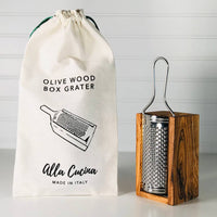Olivewood cheese grater presented as an elegant kitchen gift