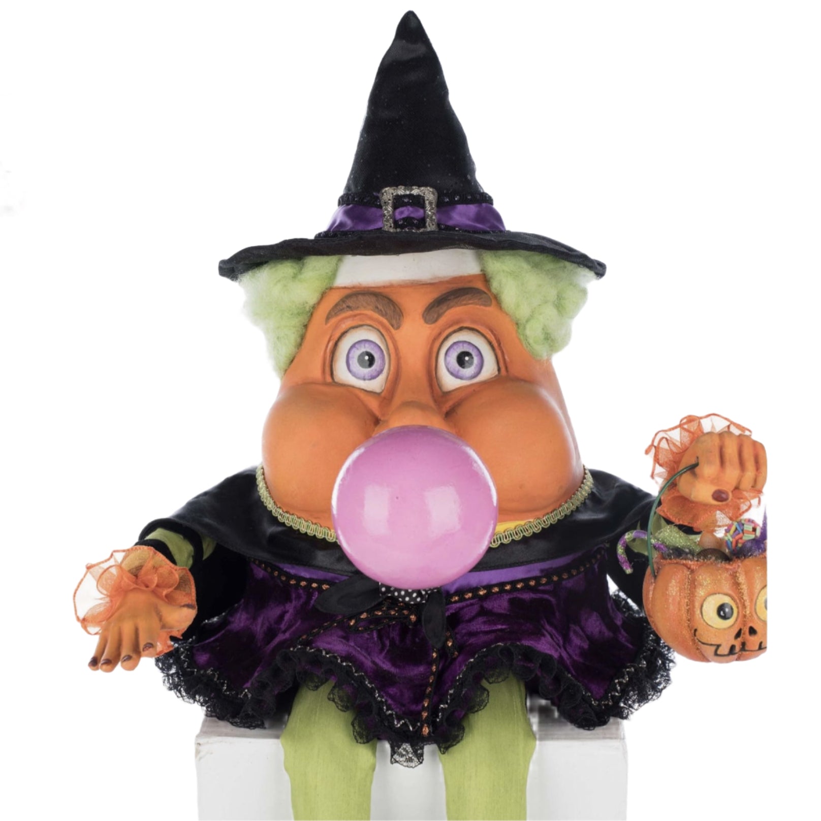 Detailed image of Katherine's Collection, Bubbles’ expressive face and glossy bubble detail beneath her witch hat.
