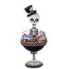 Billy Bones staged in a Halloween setup as a centerpiece on a decorated table.
