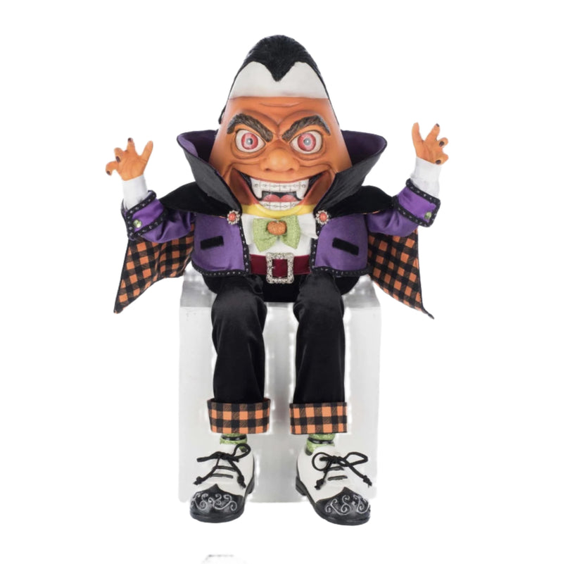 Front-facing view of Katherine's Collection Count Candy Corn showcasing his sweet vampire grin, plush velvet costume, and candy pail.