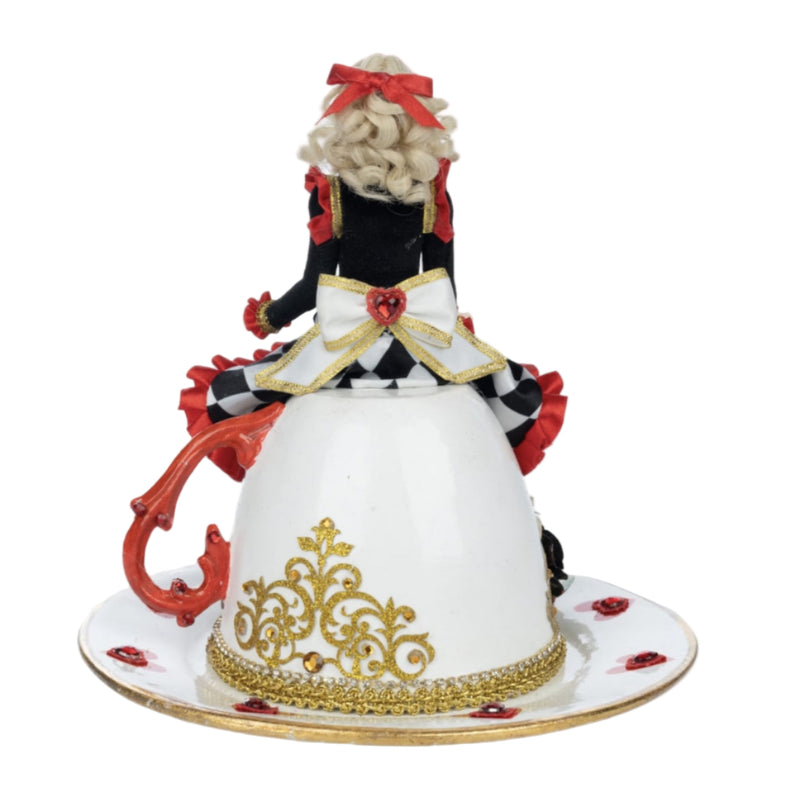 back view of Katherine’s Collection Red Alice figurine sitting on teacup decorated with crystals and gold filigree
