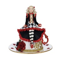 Front view of Katherine’s Collection Red Alice on Teacup figurine with jeweled details