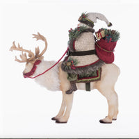 Side angle of Santa Riding Caribou figurine, Katherine’s Collection SKU 28-428269, GTIN 810074127820.