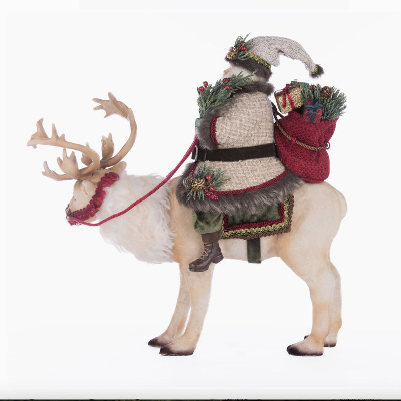 Side angle of Santa Riding Caribou figurine, Katherine’s Collection SKU 28-428269, GTIN 810074127820.