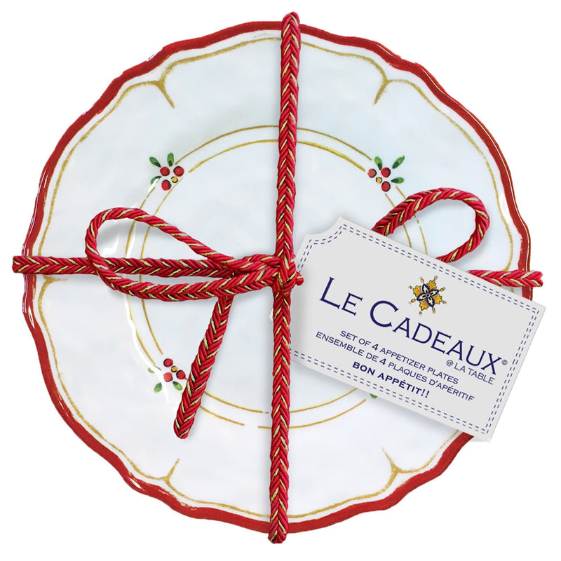 Le Cadeaux Natalie four-piece Decorative Holiday appetizer plate set with decorative red ribbon and 'Le Cadeaux' label on a white background