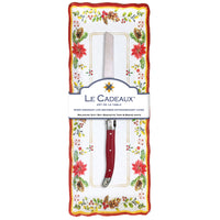 Le Cadeaux knife and baguette tray set with Christmas floral design pinecones and poinsettias and greenery in packaging