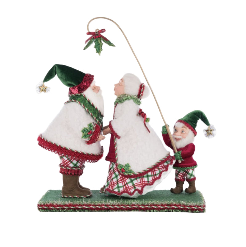 Katherine’s Collection Mr. and Mrs. Claus Under the Mistletoe resin figurine, SKU 28-428516, GTIN 810074128544, holiday tabletop decor.