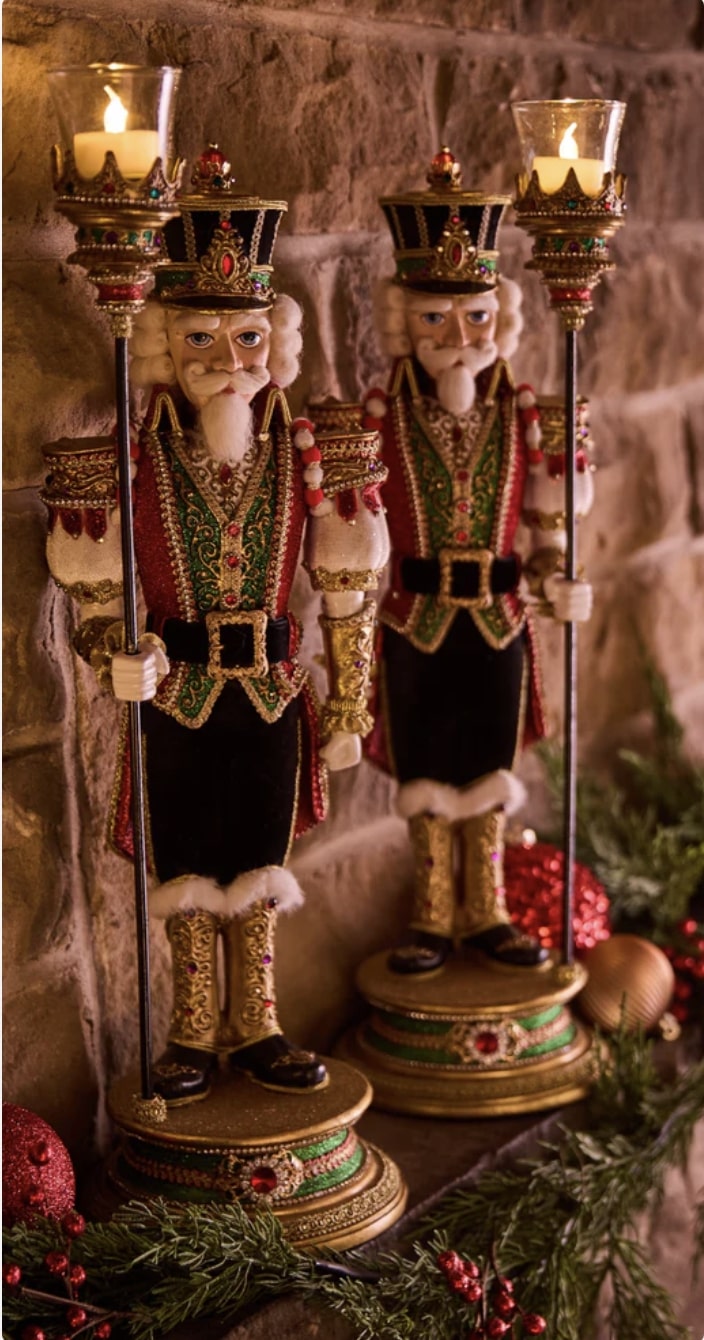 Add warm light to your mantel or table with hand-painted Nutcracker votive holders from the Royal Christmas Ball Collection.