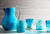 Side view emphasizing ergonomic handle and artisan design