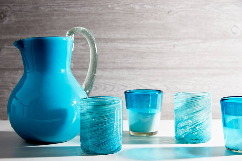 Side view emphasizing ergonomic handle and artisan design