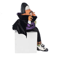Right Side profile view showing Count Kandy Corn with dangling legs, cape detail, and buffalo plaid outfit.