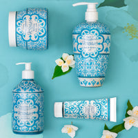 Rudy Profumi Versila bath and shower gel, body cream, hand cream, and hand wash, coastal Mediterranean scent with decorative blue and white tile packaging on a blue background