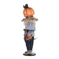 Left side profile of Katherine’s Collection Scarecrow with Sunflowers Halloween doll holding basket of faux wildflowers, SKU 28-428183, GTIN/UPC 810074127288