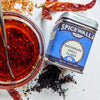 Close-up of Spicewalla chili flakes—Gochugaru, Aleppo, and Urfa—showing rich textures and colors.
