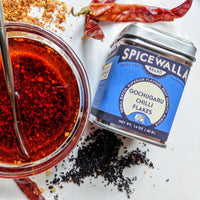 Close-up of Spicewalla chili flakes—Gochugaru, Aleppo, and Urfa—showing rich textures and colors.