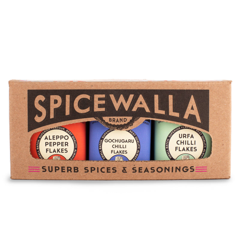 Spicewalla Hot Stuff Chilli Collection 3-Pack Gift Set featuring Gochugaru, Aleppo, and Urfa flakes in decorative tins.