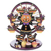 Halloween-themed candy wheel with pumpkin character on a white background