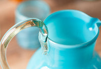 Close-up highlighting recycled glass and artisan imperfections