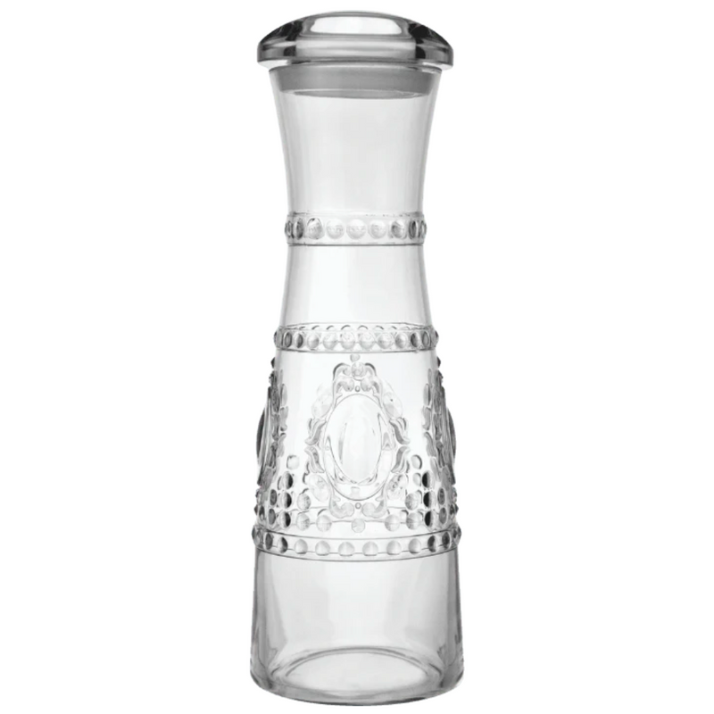 Clear polycarbonate carafe with decorative patterns on a white background from Baci Milano
