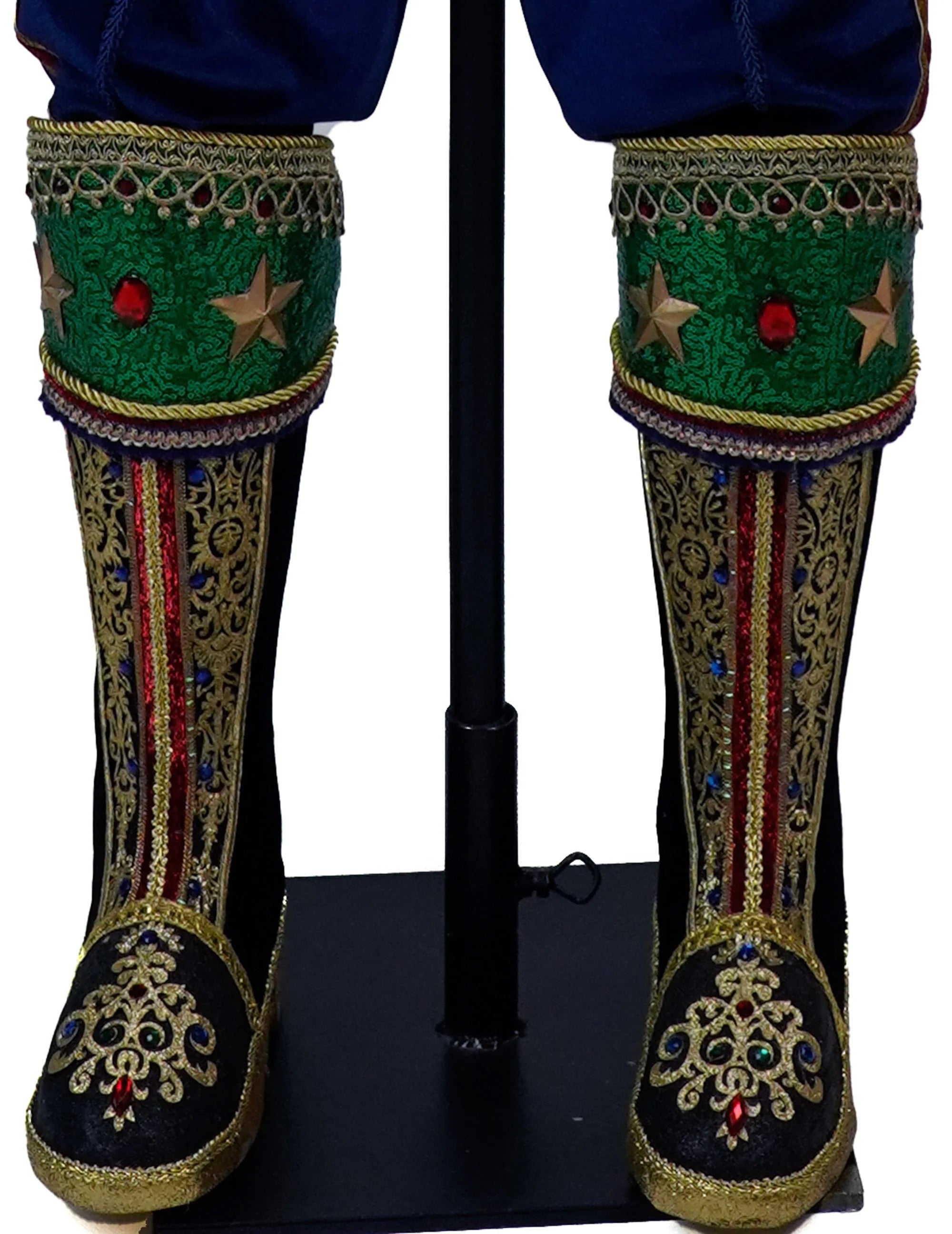 Decorative tasseled boots on Baron Wintermarch life-size Christmas nutcracker