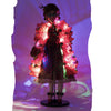 Lit for night, the katherines collection Holiday Magic Mae doll holding poinsettia handbag with festive holiday details