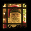Limited edition Santa In Window holiday décor with velvet, plaid, and jeweled details. Lit for night