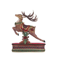 side view of katherines collection opulent Christmas reindeer statue with gold and green accents