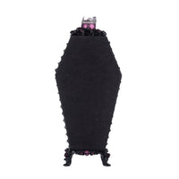 Back view of pink Halloween Coffin Cabinet Menagerie by Katherine’s Collection, SKU 28-428153, with floral wallpaper and pink velvet.