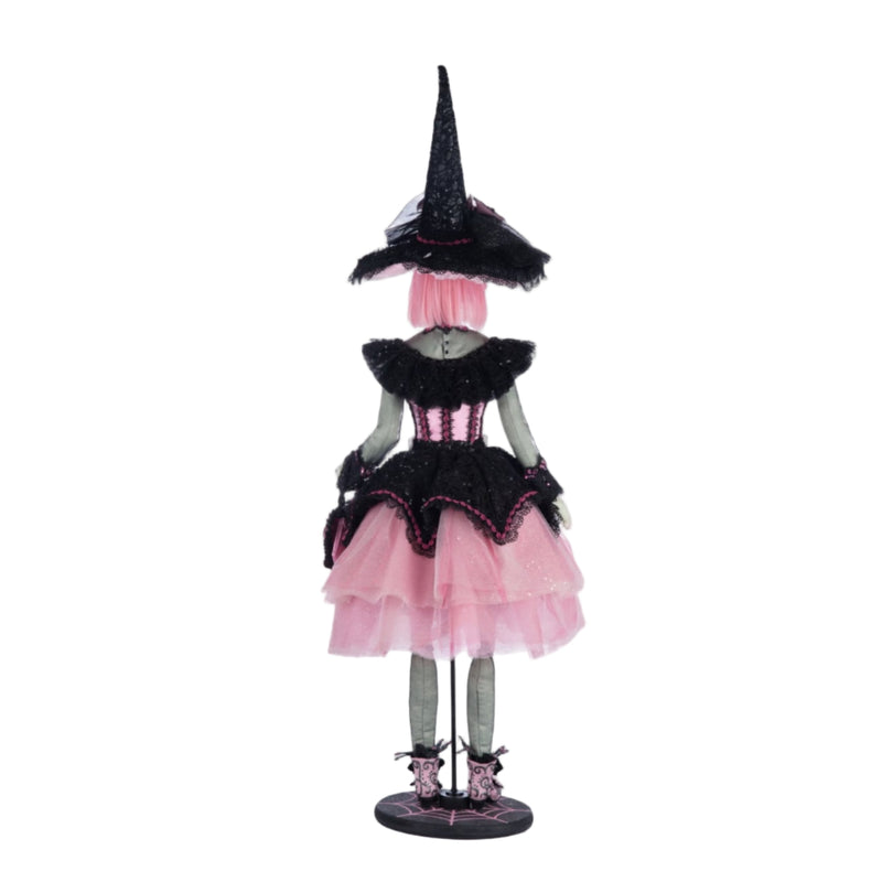 Katherine’s Collection Rosalie Blackthorn Doll 28-428140 back view, handcrafted Halloween witch with black lace, pink satin, and jeweled hat.